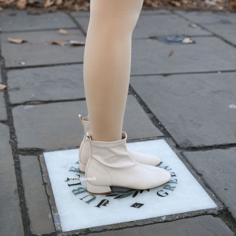 Soft cream boots